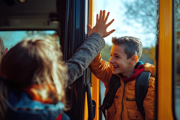 Teacher giving high five to kids while entering in bus