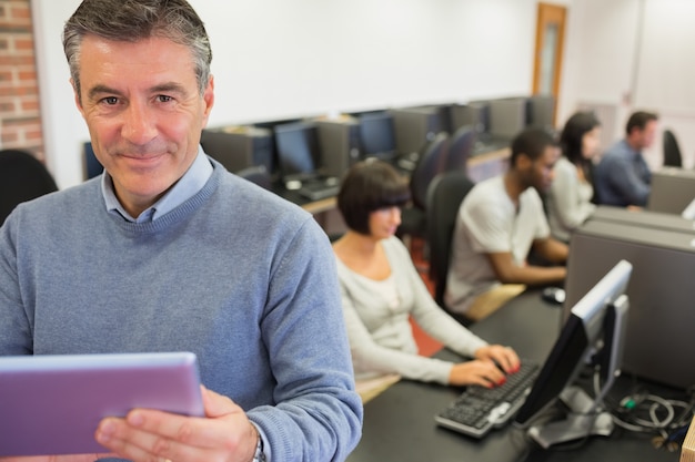 Teacher holding a tablet PC