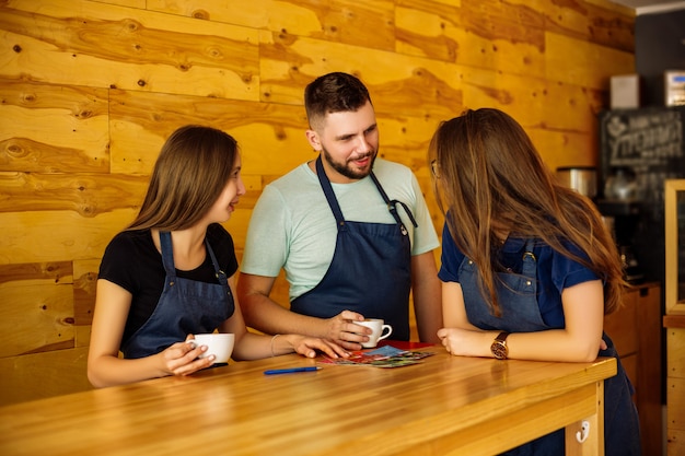 Team communication barista in a coffee house