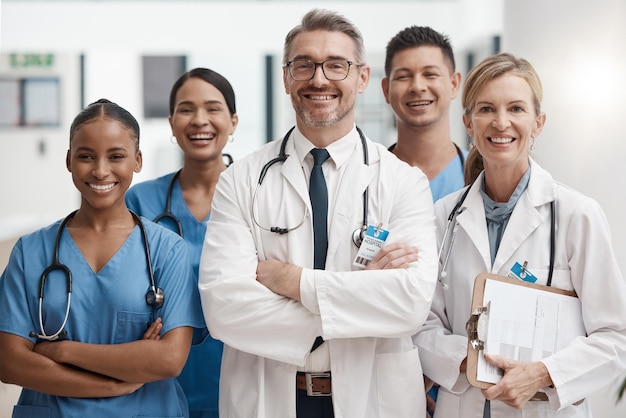 Team of doctor and nurse with vision teamwork and arms crossed while working at a hospital Happy medical expert healthcare and professional group smile at work together for success at a clinic