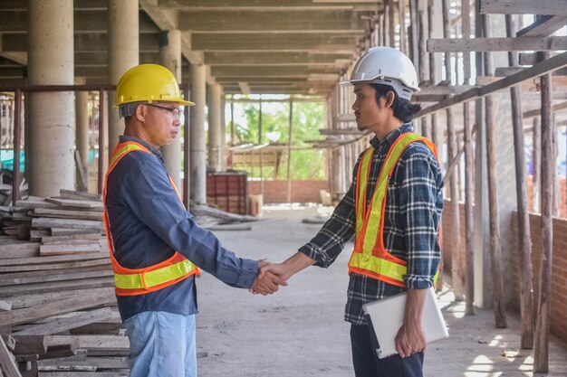 Team engineer Two man architect on a building construction site