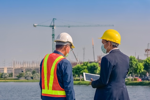 Team engineer Two man architect on a building construction site