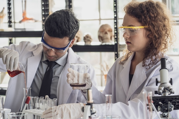 Team of Medical Research Scientist Conducts Experiments in Laboratory.