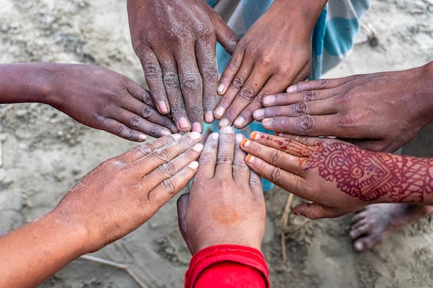 Team put hands together Business people jointly symbolize hands together To show team work