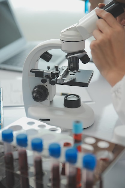 Team of Scientists Choose Between Printed Circuit Board to Work With In The Background Technologically Advanced Scientific Research Center