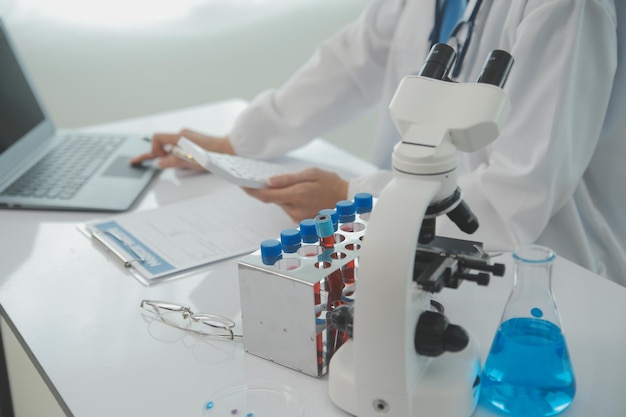 Team of Scientists Choose Between Printed Circuit Board to Work With In The Background Technologically Advanced Scientific Research Center