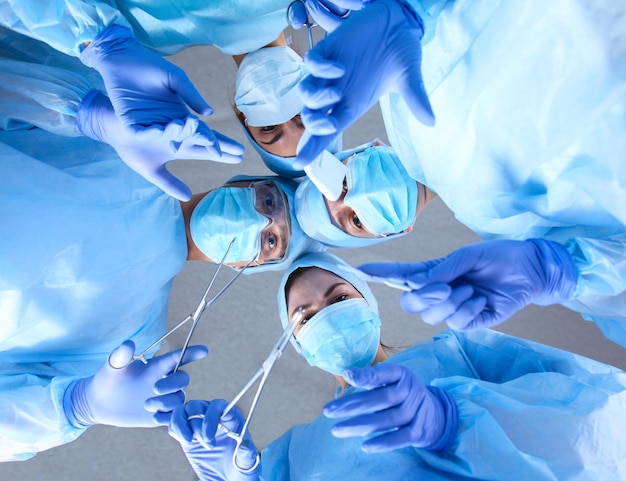 Team surgeon at work in operating room