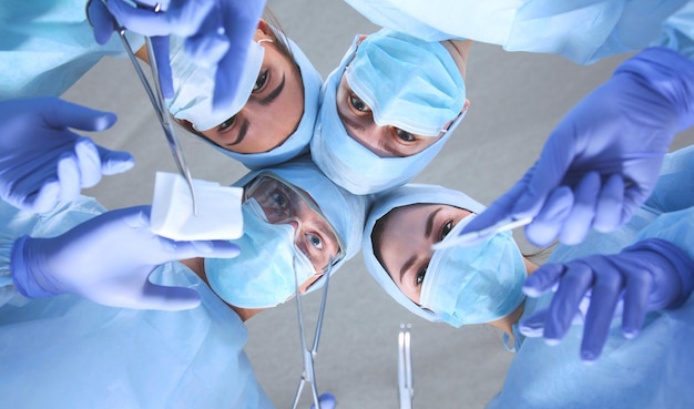 Team surgeon at work in operating room