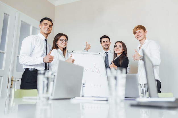 Team of young businesspeople in office