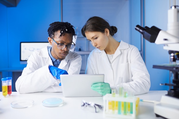 Team of Young Scientists in Laboratory