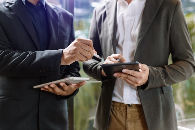 Teamwork people concept. team of coworkers making great business discussion .businessman talking with partners. in coworking office