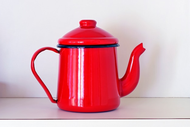 Teapot in red enamel