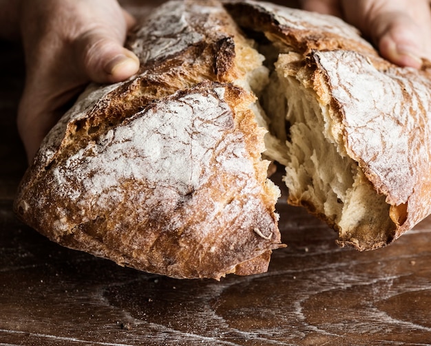 Tearing a bread loaf photography recipe idea