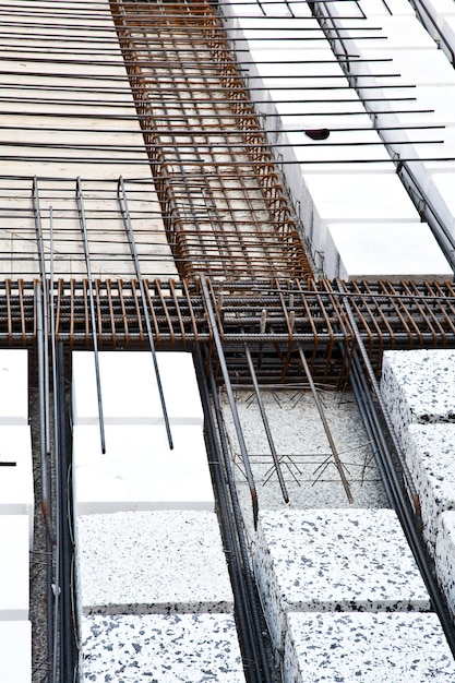 Technical detail of building operations: floor. Materials: polystyrene, steel bars, concrete