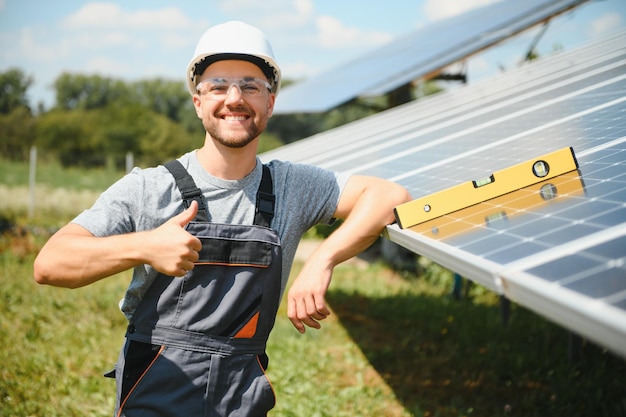 Technician checks the maintenance of the solar panels