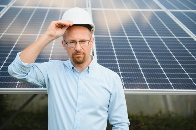 Technician checks the maintenance of the solar panels