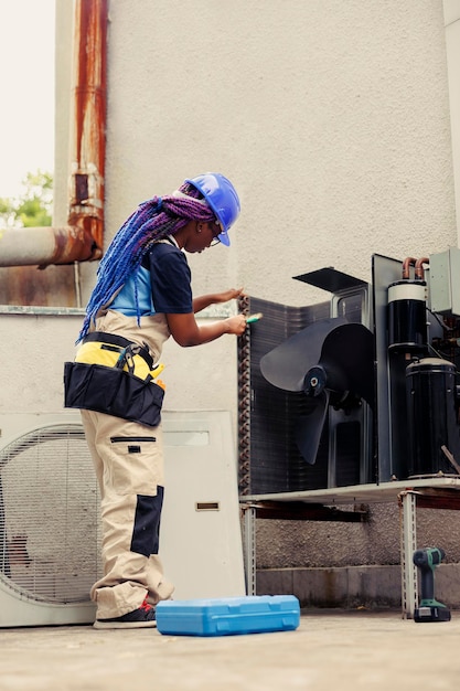 Technician dusting hvac system filters