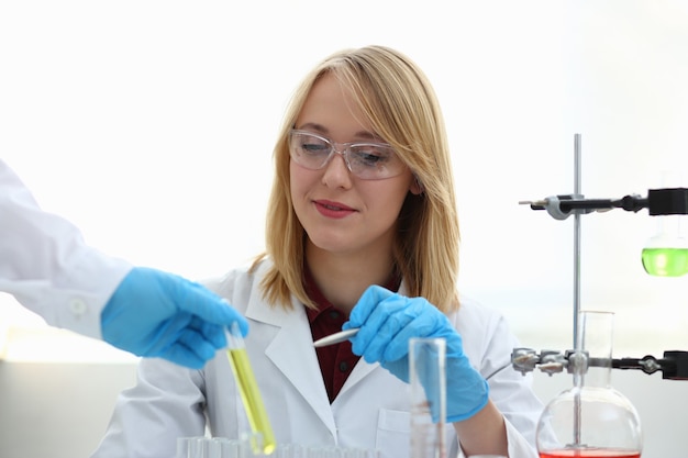 Technician hold in arms in protective gloves