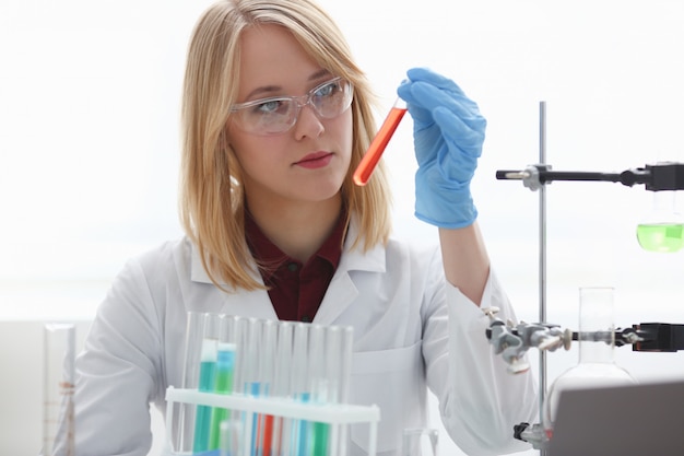 Technician hold in arms in protective gloves