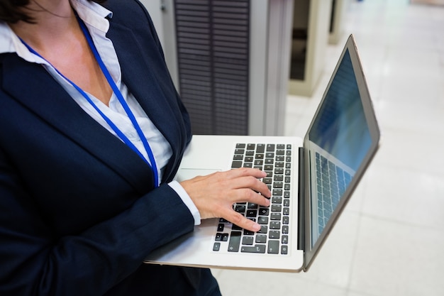 Technician working on laptop