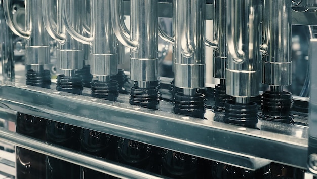 Technology demonstration of filling and capping bottles in the industry