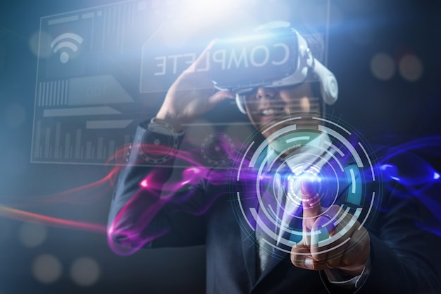 Technology and digital business innovation concept, Businessman wearing glasses of virtual reality goggles 