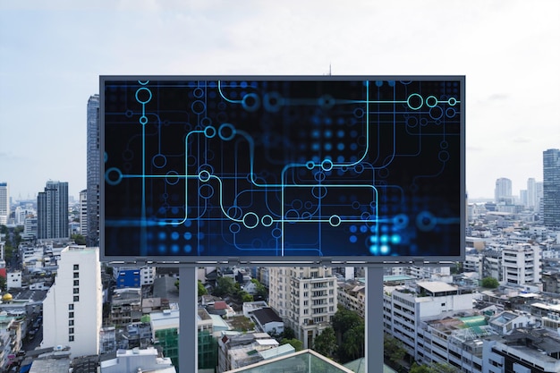 Technology hologram on billboard over panorama city view of Bangkok The largest tech hub in Southeast Asia The concept of developing coding and hightech science