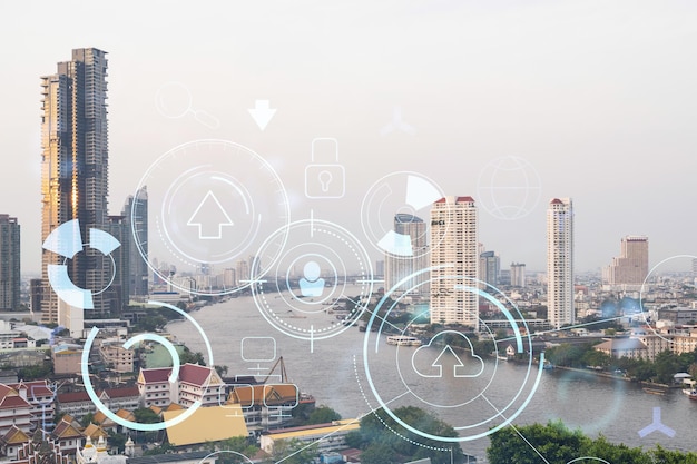 Technology hologram over panorama city view of Bangkok The largest tech hub in Southeast Asia The concept of developing coding and hightech science Double exposure