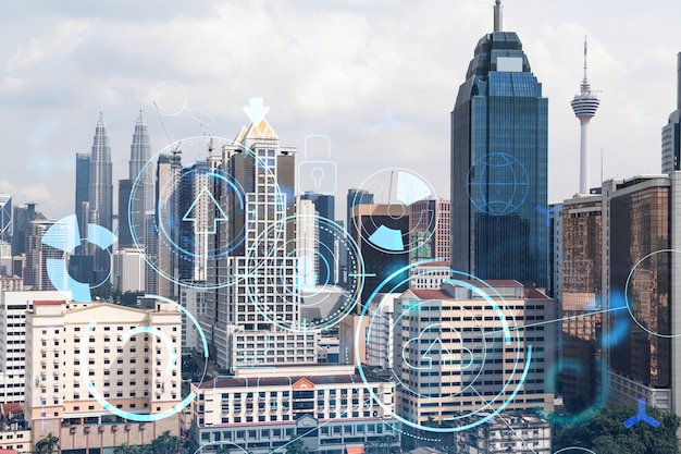 Technology hologram over panorama city view of Kuala Lumpur KL is the largest tech hub in Malaysia Asia The concept of developing coding and hightech science Double exposure