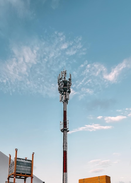 Technology on the top of the telecommunication GSM 5G4G tower with copy spaceCellular phone antennas on a building roofTelecommunication mast television antennasDevelopment communication system