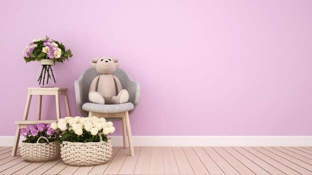 Teddy bear on armchair and flower in pink room 