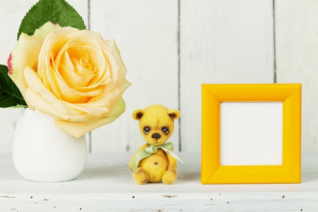 Teddy bear,  frame mockup, rose in vase