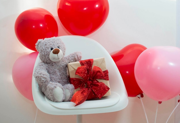 Teddy bear and a red rose. valentine's day. Holiday greeting card, love card, happy birthday.