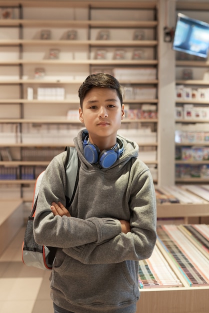 Teenage boy in library