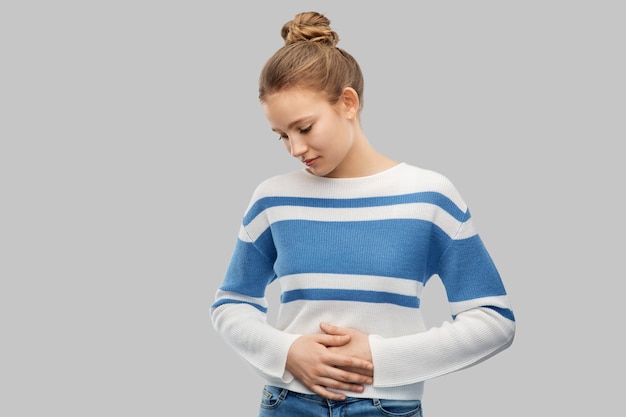 Photo teenage girl having stomach ache