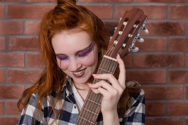 A teenage girl with bright colorful makeup