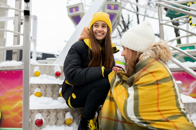 Teenager friends having fun in winter time