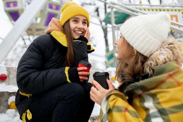 Teenager friends having fun in winter time