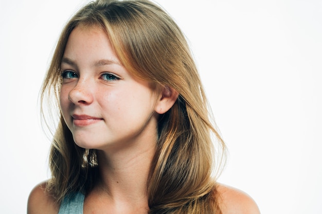 Teenager girl woman female portrait freckles face isolated on white. Studio shot.