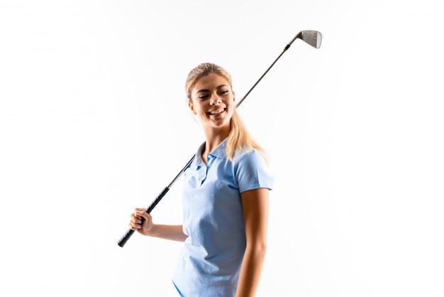 Teenager golfer girl over isolated white background