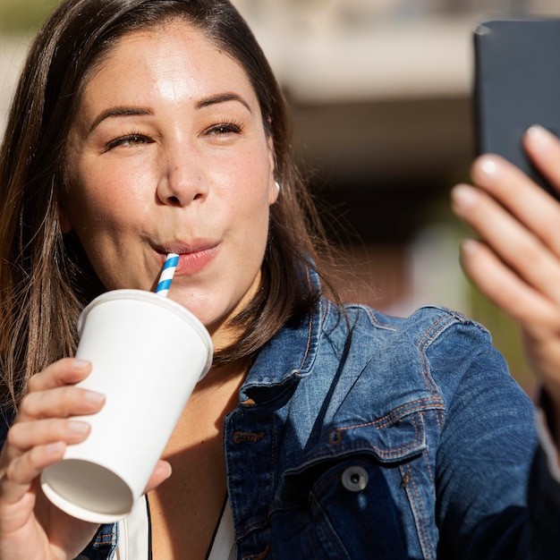 Teenager talking a selfie outdoors