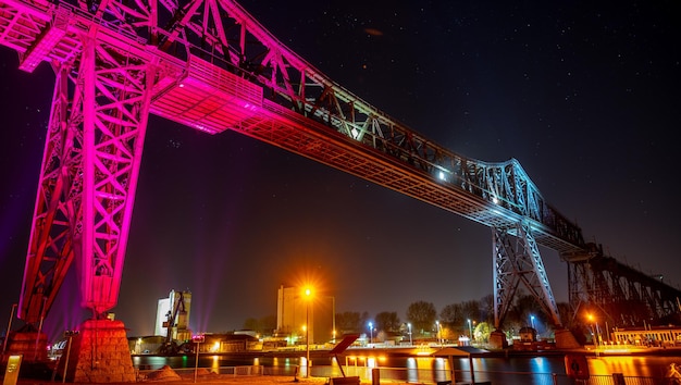 Tees Transporter Bridge under the colorful lights at night in Middlesbrough United Kingdom