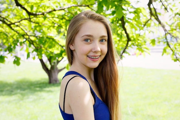 Teeth,emotions, health, people, dentist and lifestyle concept - Healthy, beautiful smile, the child to the dentist.Portrait of a little girl with orthodontic appliance .