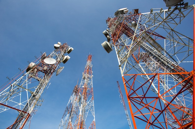 Telecommunication mast TV antennas with blue sky in the morning