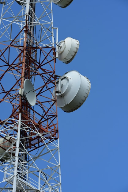 Telecommunication tower with antennas. 