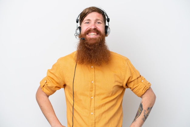 Telemarketer man isolated on white background laughing