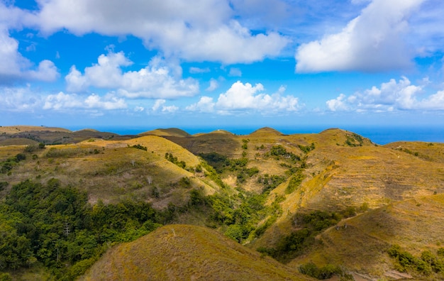 Teletubbies Hill. Drone Shot Tropical Savanna Hills at Nusa Penida, Bali - Indonesia