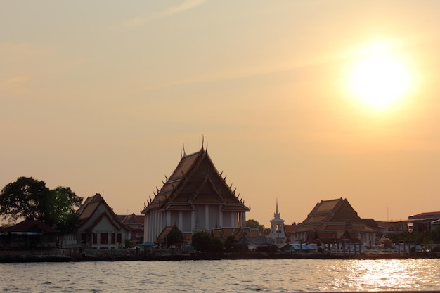 Temple against sky during sunset