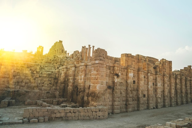 Temple in the Ancient Roman city of Gerasa modern Jerash JordanOld columns of ancient buildings on the blue sky Ancient Roman sights in the Mediterranean