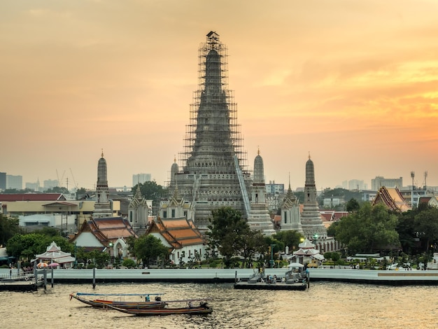 Temple of Dawn pagoda under twilight sky